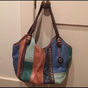 The Sak multi-color (blue, green, brown).