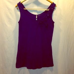 Deep navy tank with flower detail.