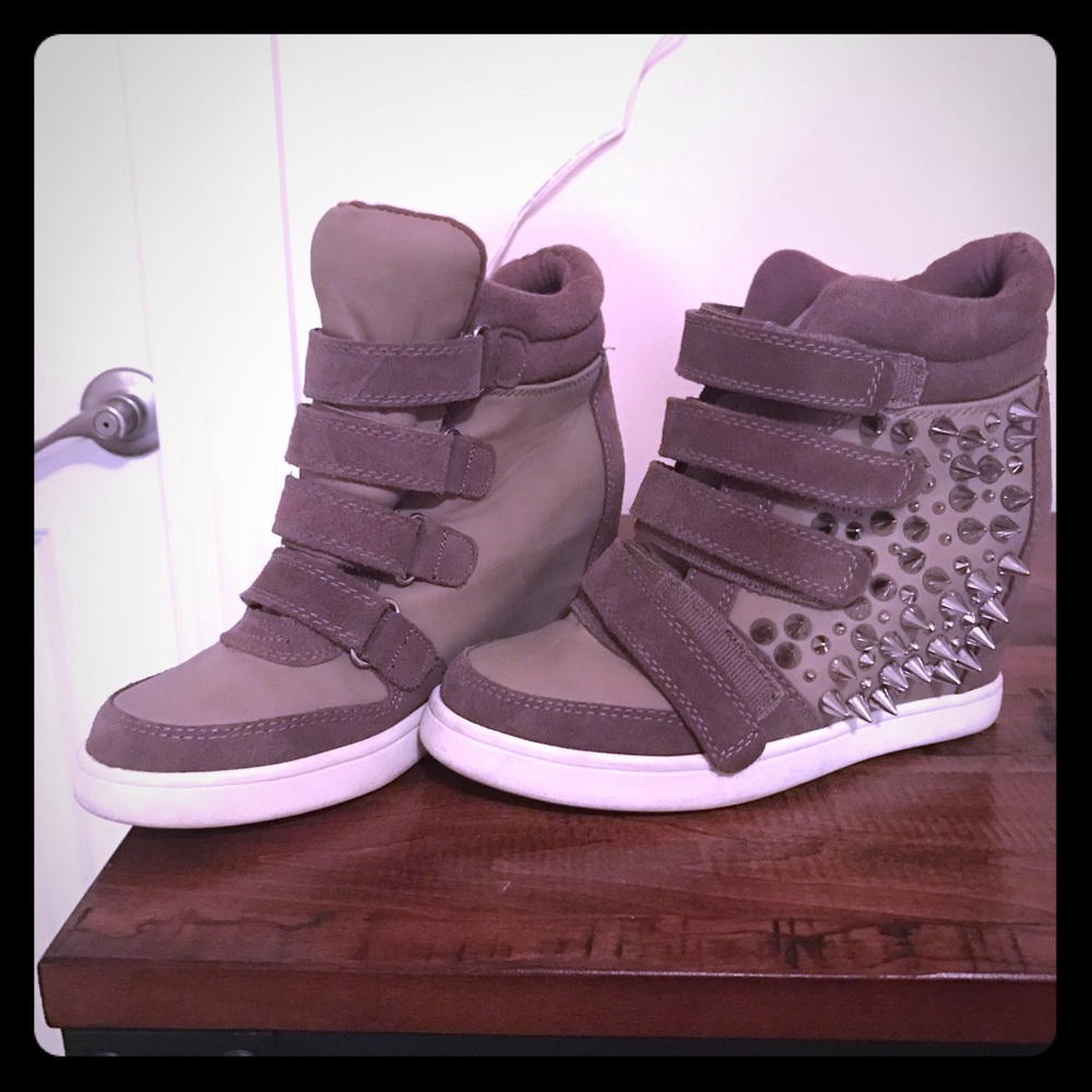 Aldo platform sneakers fits size 8 as well.