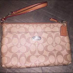 Coach large wristlet.  In beautiful condition