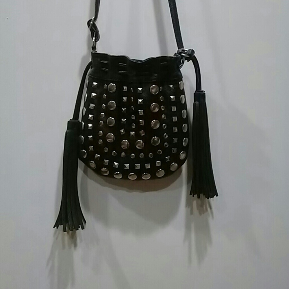 black leather studded call it spring tassle bag