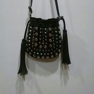 black leather studded call it spring tassle bag