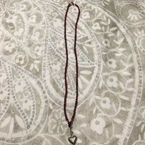 Beaded necklace with heart pendant