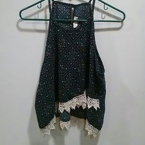 patterned navy blue crop top with crochet detail