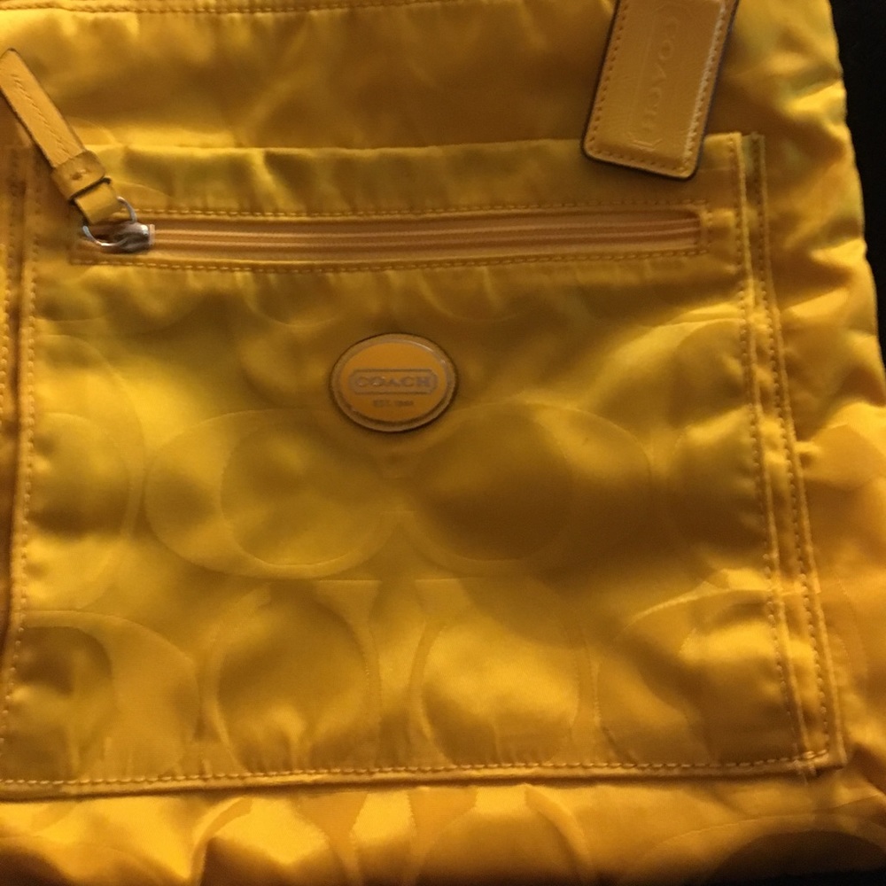 Coach yellow cross body bag.