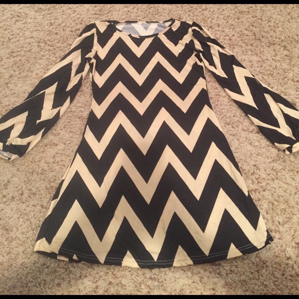 Long sleeve black and white dress.