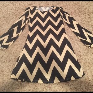 Long sleeve black and white dress.