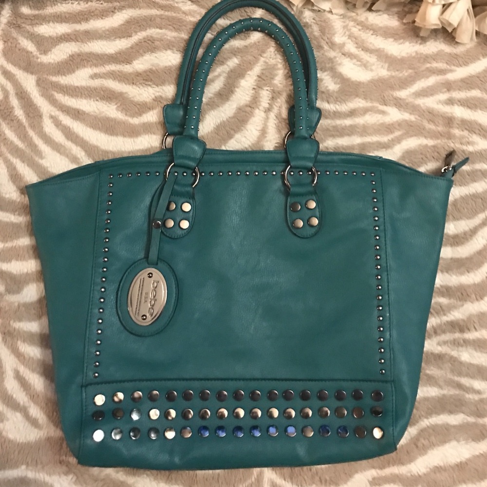 Beautiful turquoise/teal leather studded Bebe tote
