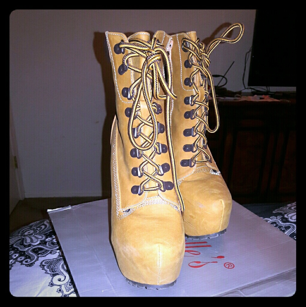 High heel construction boots