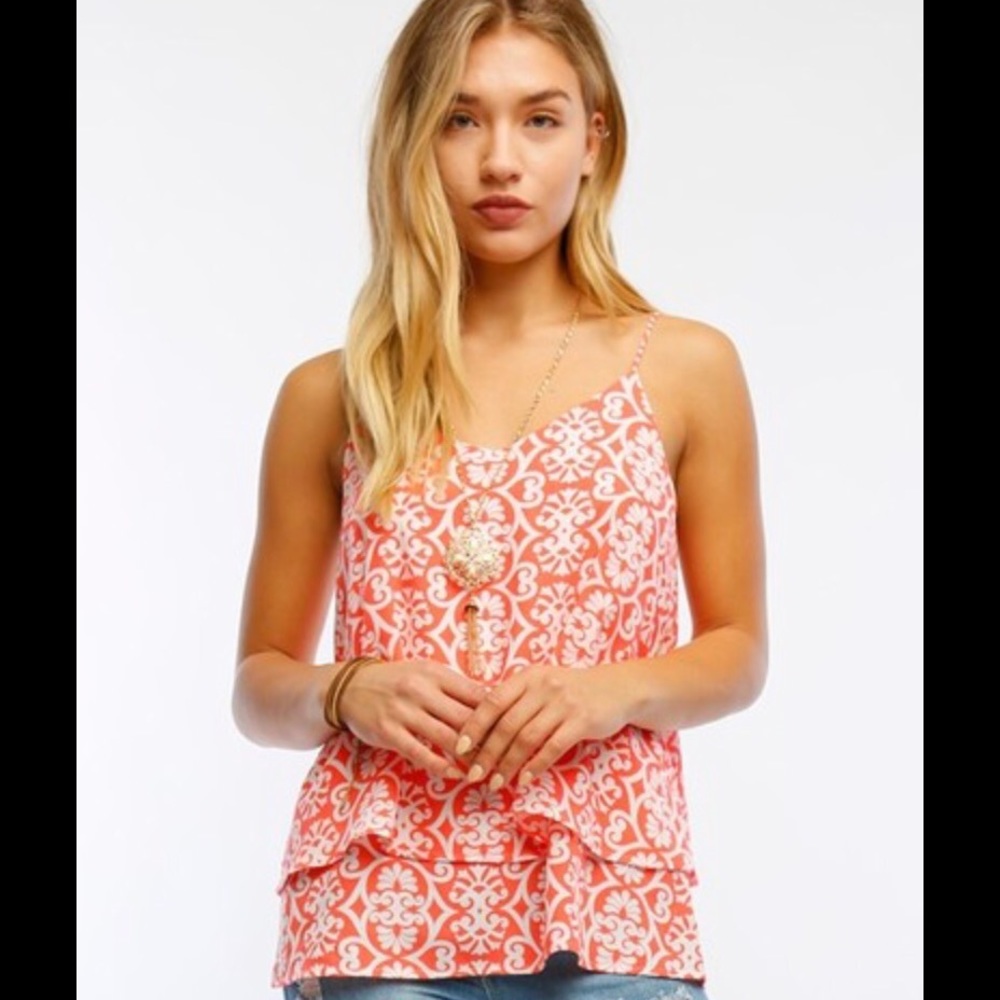 Just in! Gorgeous flowy tank. 🌺