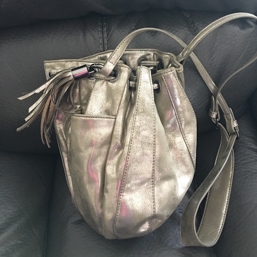 Satchel with shiny, chrome design