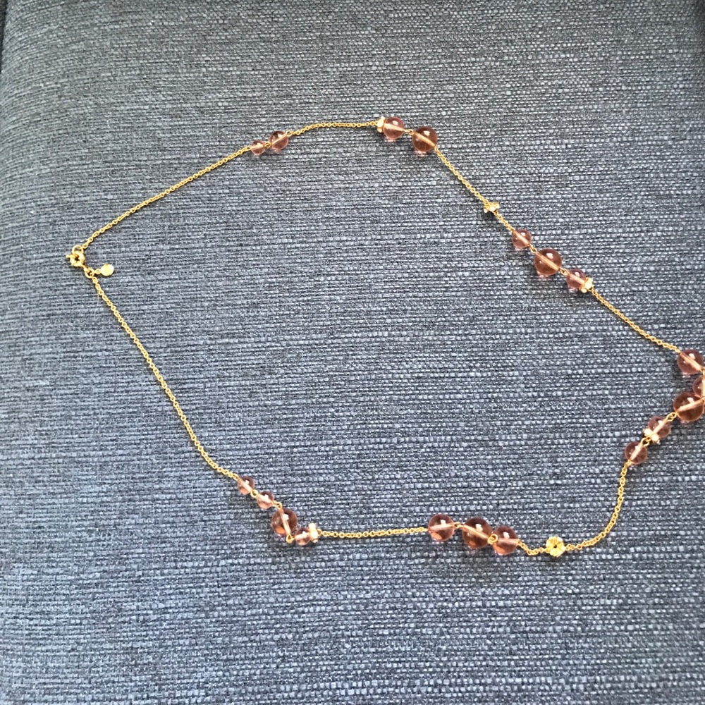 rose colored head necklace