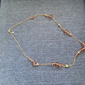 rose colored head necklace