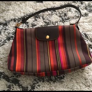 Longchamp canvas purse.