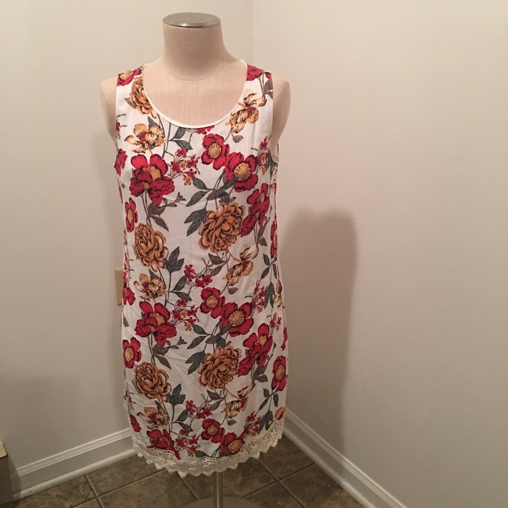 3/$18 Cream floral dress with crochet bottom