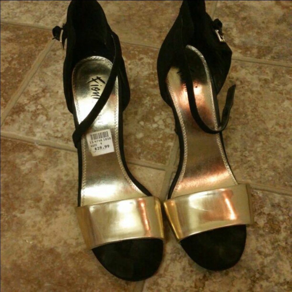 Black and gold heels
