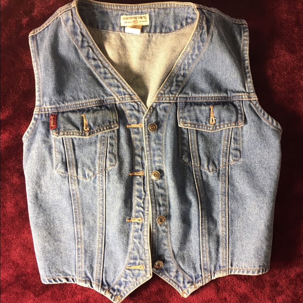 Large sleeveless blue jean jacket