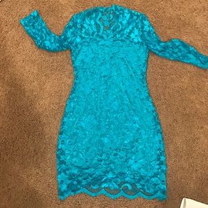 Sexy turquoise lace dress. Tags still on