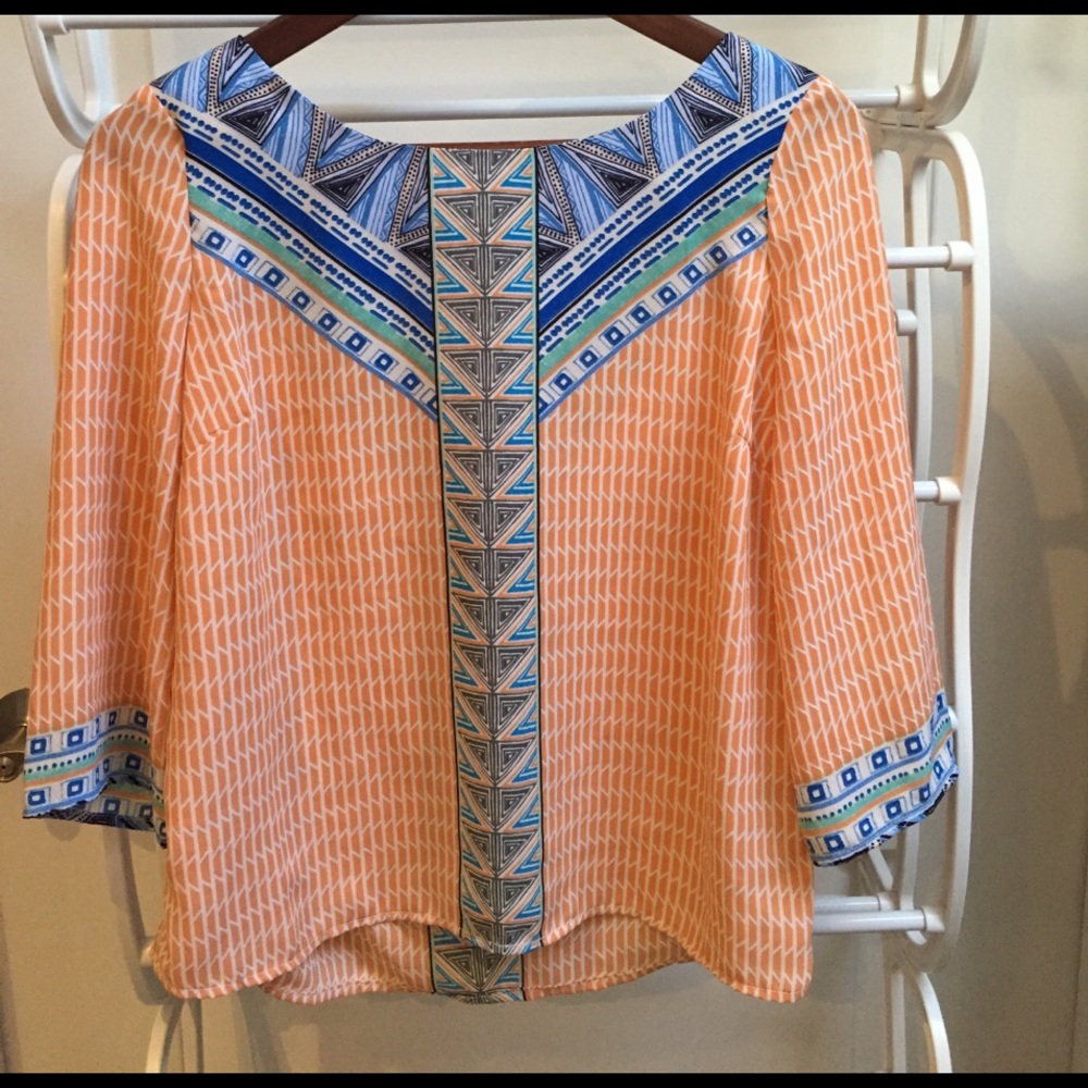 Under skies orange/blue blouse