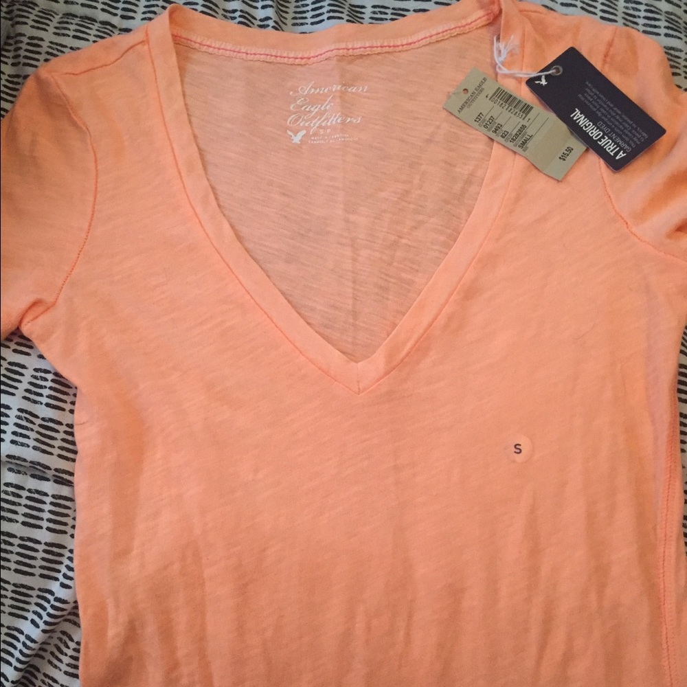 Brand new bright orange top