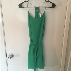 Green mini dress with tie spaghetti straps