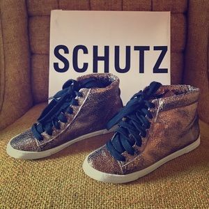 Schutz Worn Once!!! gold high top sneakers!