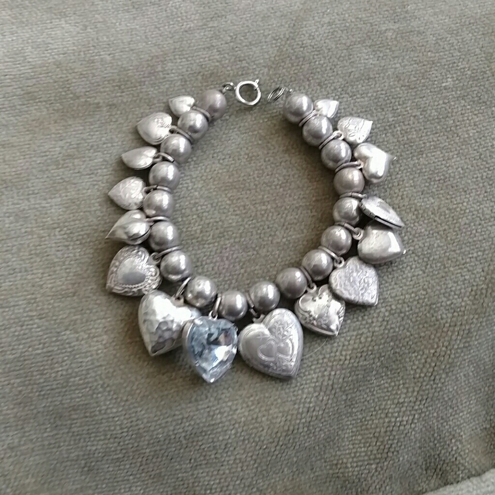 Sterling silver bracelet with Crystal heart charms