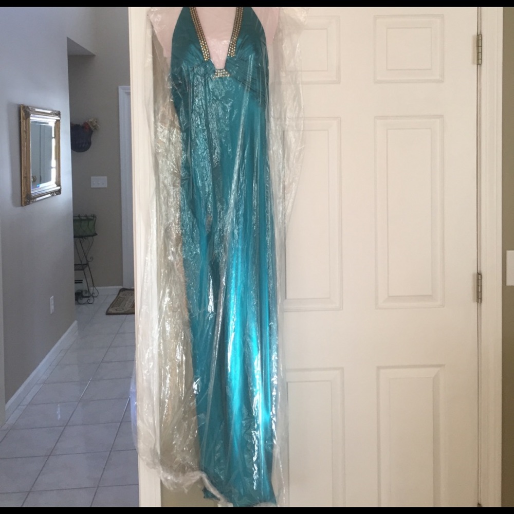 Size 6 turquoise gown with gold and diamonds