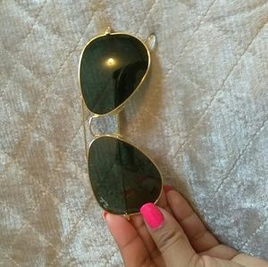 Black Ray-Ban Aviator sunglasses