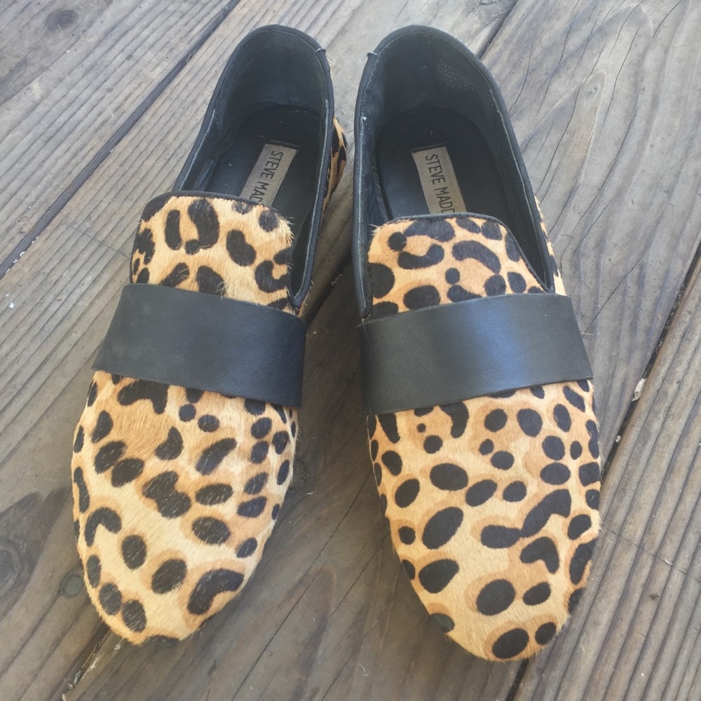 Leopard pony hair slip ons.