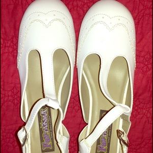 White wing tip heels