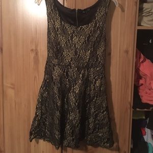 Black and gold skater dress