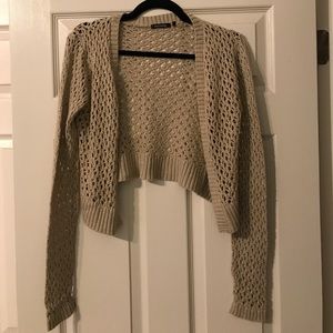 Tan cardigan with gold sparkle.