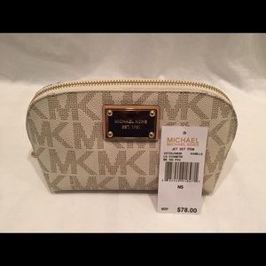 NWT Michael Kors PVC makeup bag in color Vanilla