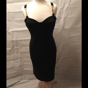 Sexy black dress with gold buckle detail