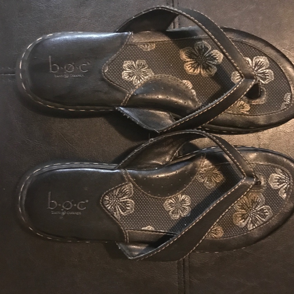Born size 7 black leather (man made) flip flops.