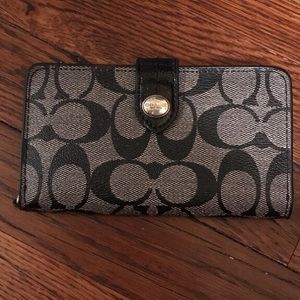 Black and gray Coach wallet