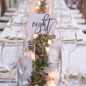 Eight bronze-glazed table number holders wedding