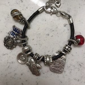 Brighten bracket with charms