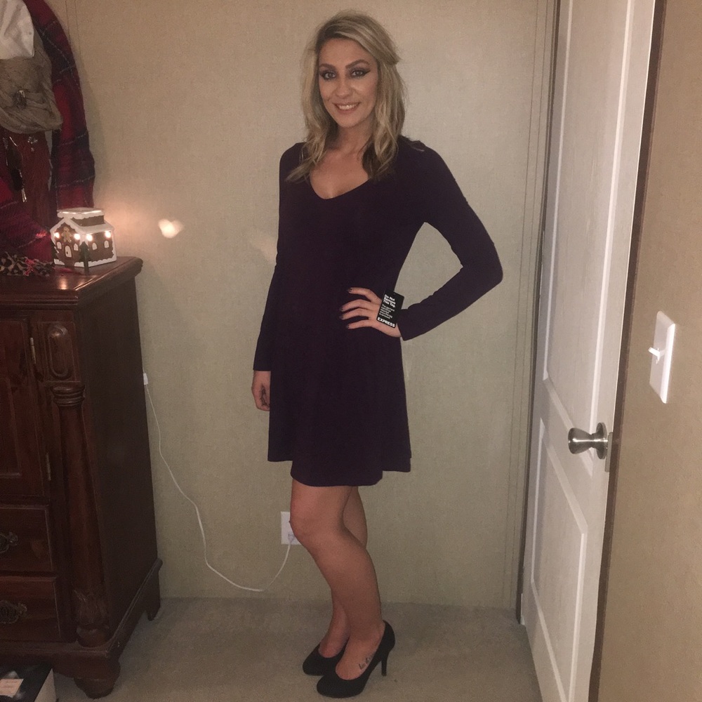 Plum color v-neck dress.