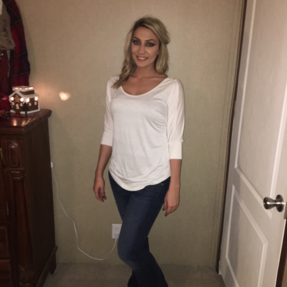 Super cute lace back shirt.