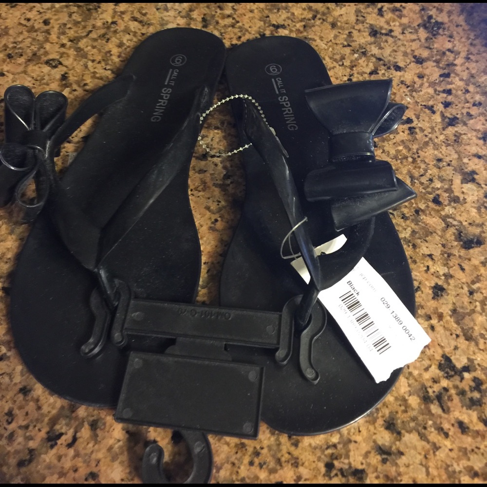 Call It Spring bow detail jelly flip flops black
