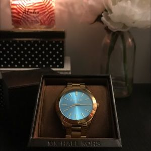 Michael Kors Gold Watch with Teal Face