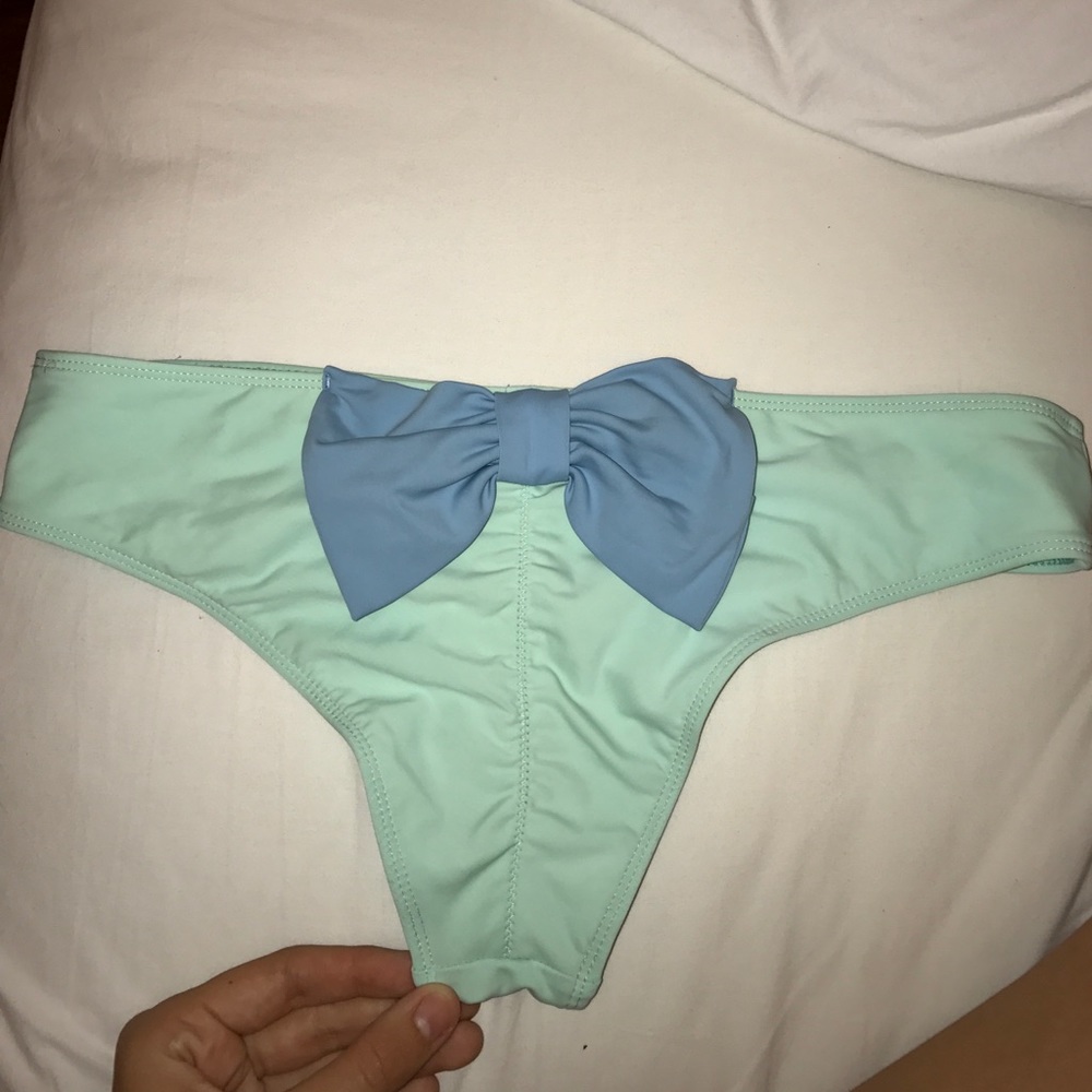 Light blue Hollister swim bottoms w bow on butt
