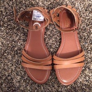 Never worn brown sandals