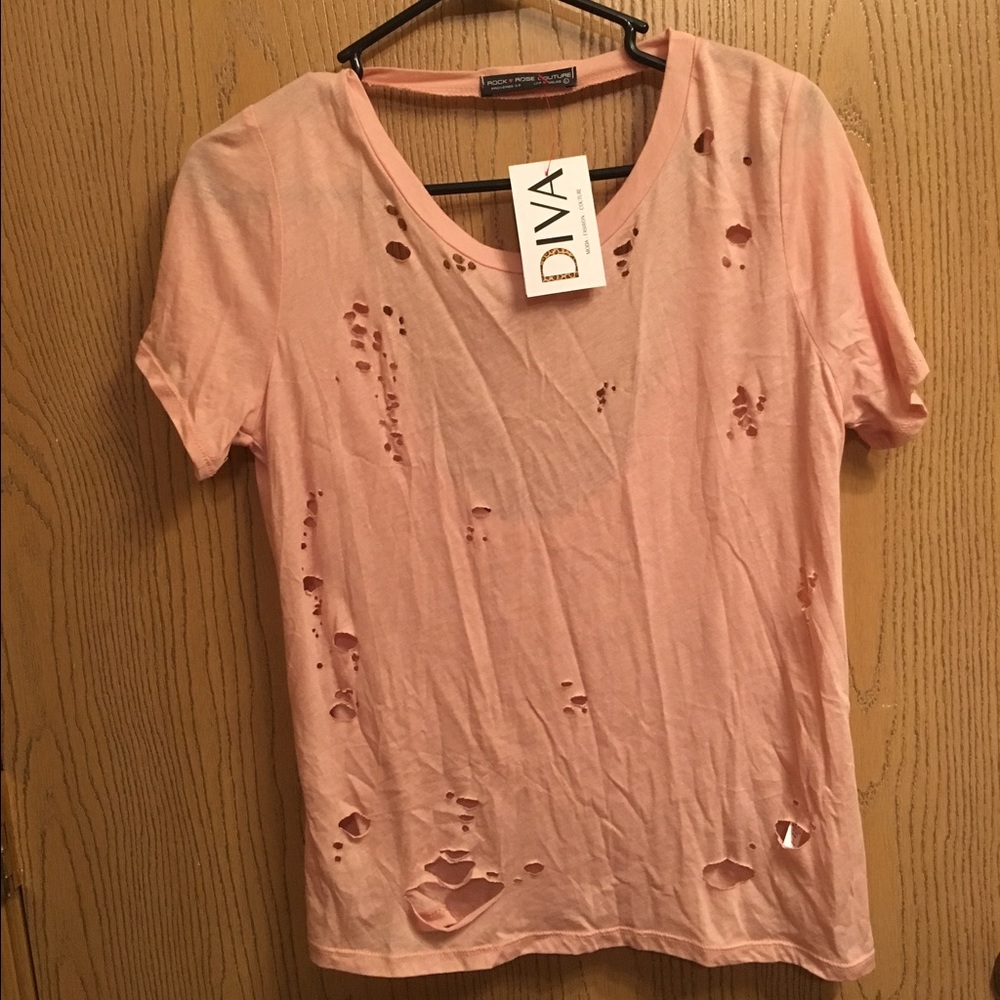 Distressed tee. NWT. Smaller fit