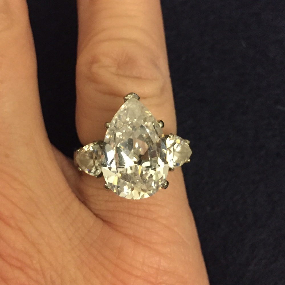 Sterling 5 ct Pear (middle stone) 3 stone ring.