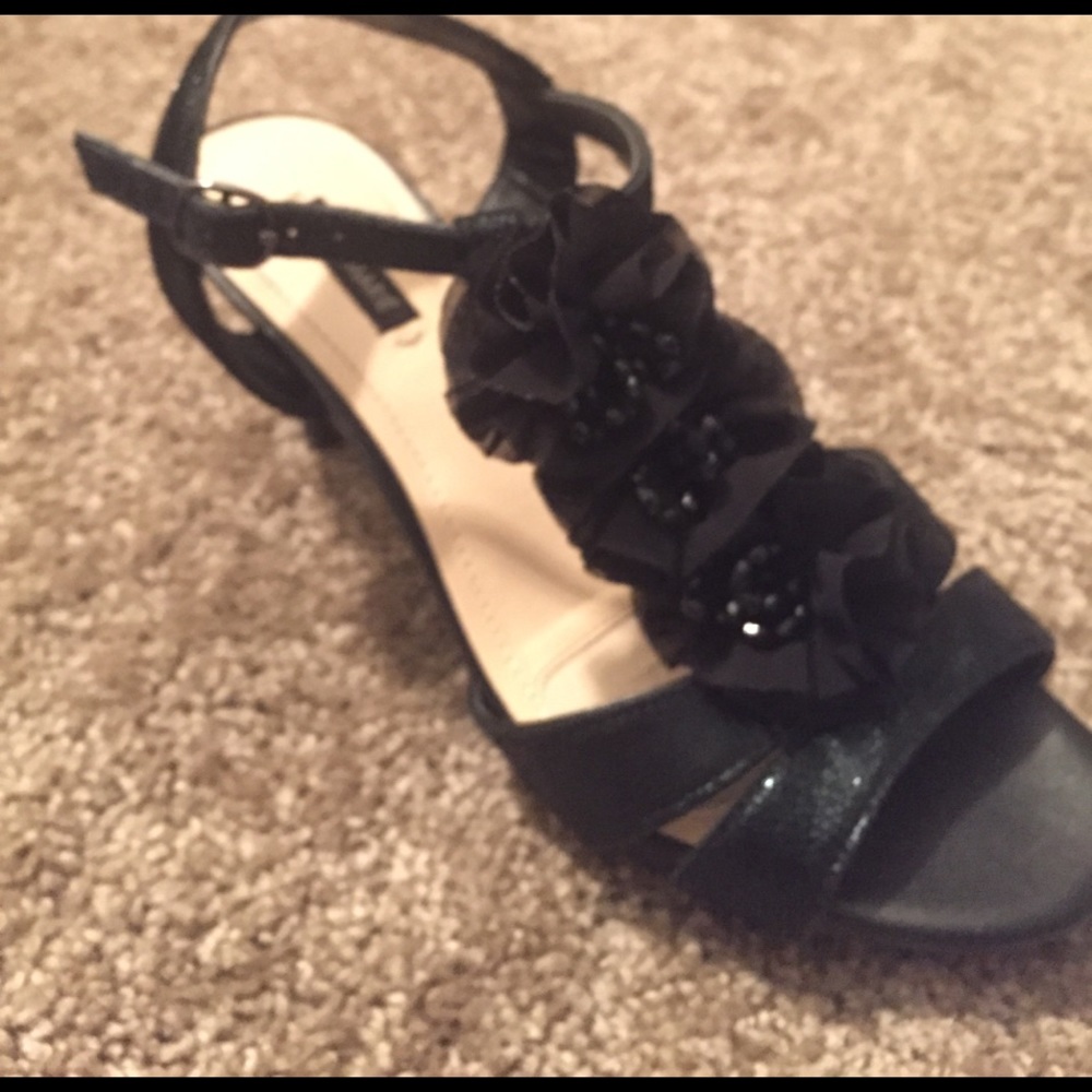 Stunning black rose heels.