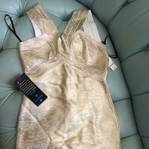 BEBE white and gold bandage dress. NWT!