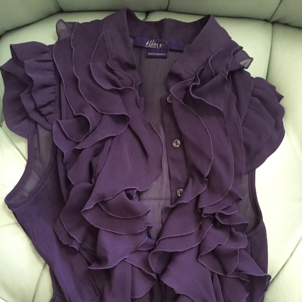 Miley Cyrus purple ruffle blouse